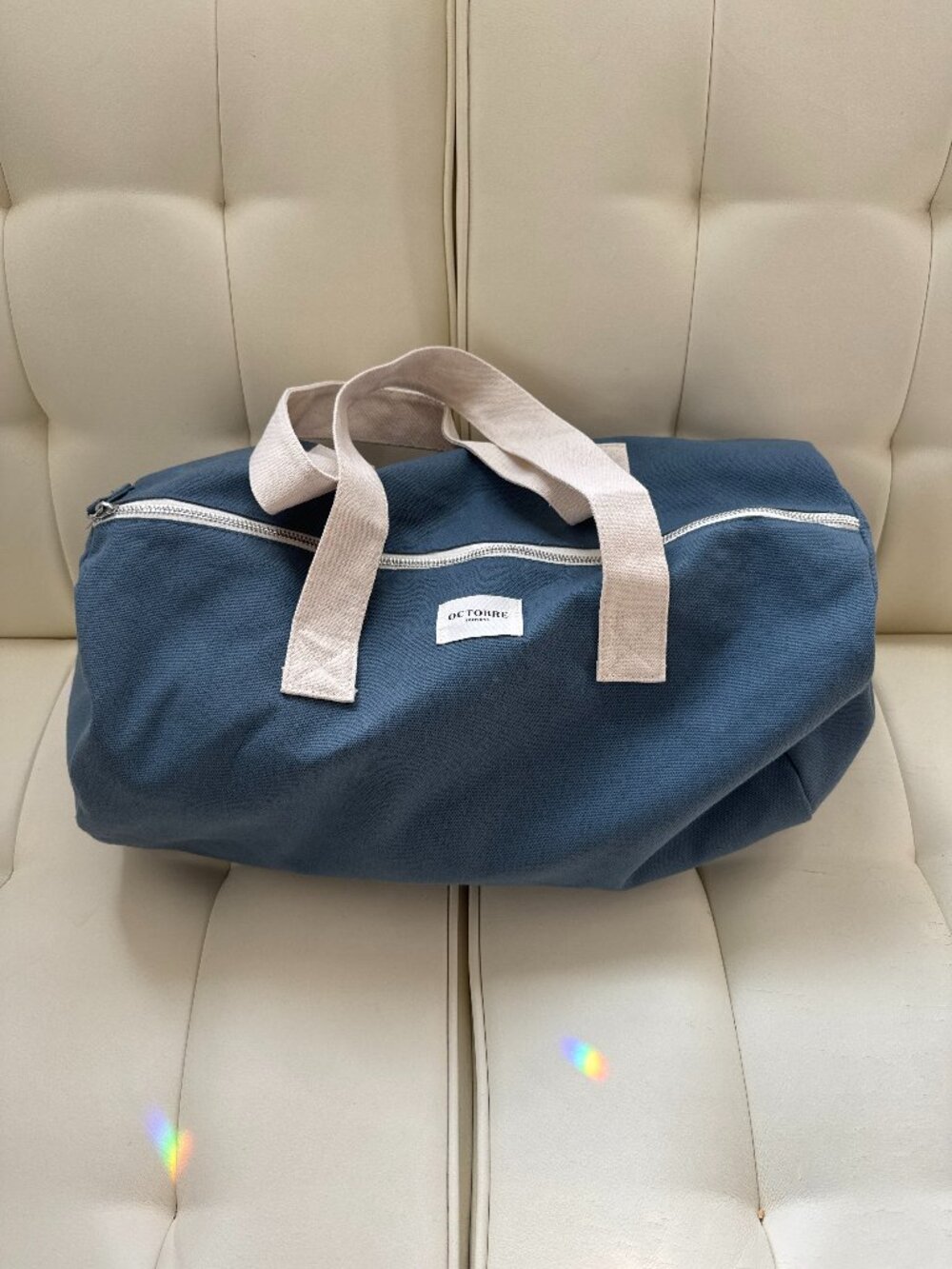 Sezane Octobre Editions vintage blue cotton canvas gym duffel bag white handles